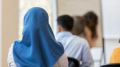 Austria's Islamic headscarf ban in force as under-14s go back to school