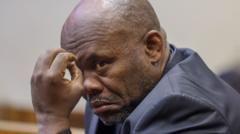 South Africa's deputy police chief resigns after being charged with sexual offences