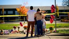Teacher fought US school attacker before armed dad shot suspect 'multiple times'